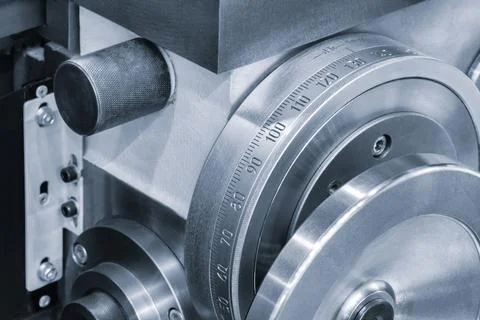 Lathe control knobs close up blue tone. Metal machine tools industry. The met Foto stock