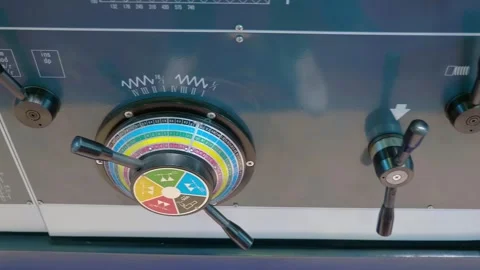 Lathe control levers for mechanical switching of equipment operating options Stock-Footage 333360347