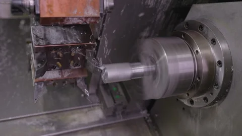 The lathe cuts off excess metal Stock Footage 313996971