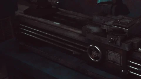 Lathe machine in dim workshop with tools scattered around the surface Stock Footage 340023826