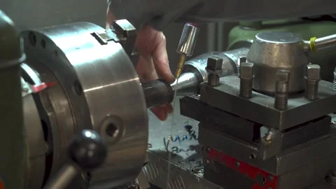 Lathe operator working in workshop Stock Footage 320867881