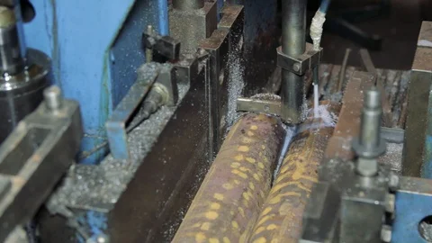 A lathe processes the metal workpiece with coolant which cool the tool  Stock Footage 111247305