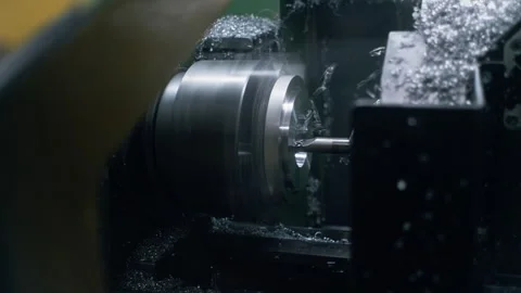 Lathe spins and cuts basic metal workpiece Video stock 240245590
