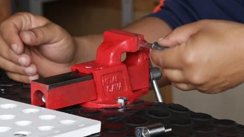 Lathe worker with a key and a door lock Stock Footage 88419119