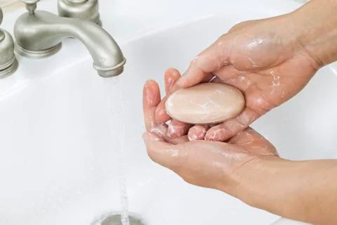 Lathering up hands Stock Photos
