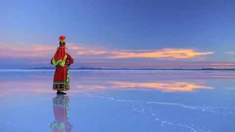 Latin American female in Bolivian National traditional dress on Salar de Uyuni Stock Footage