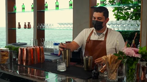 Latin bartender preparing carajillo coffee drink cocktail with flair Stock Footage 248047768