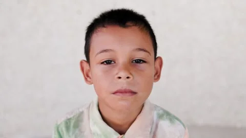 Latin child kid looking at camera, Childhood and diverse community concept Stock Footage 277336445
