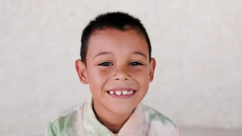 Latin child kid smiling on camera, Childhood and diverse community concept Stock Footage 274094766