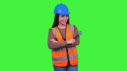 Latin construction worker woman posing on green screen Stock Footage 308743353