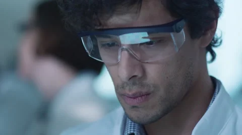 Latin Ethnicity Scientist using Tablet Computer, having Reflection in Glasses 스톡 동영상 62953957