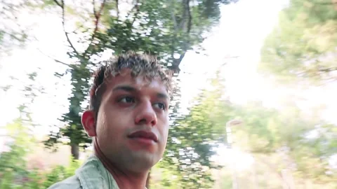 Latin guy on urban forest. Stock Footage 163151471