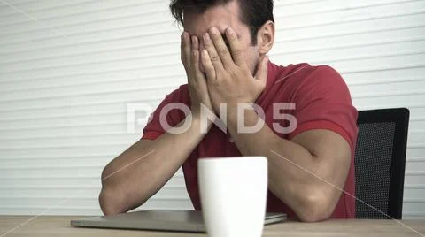 Latin Hispanic man shock with wrong decision investment result stress out Stock Photos