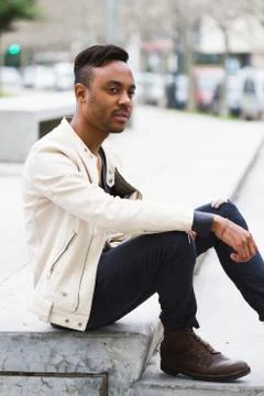 Latin man posing outdoors Stock Photos