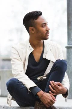Latin man posing outdoors Stock Photos