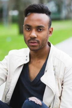 Latin man posing outdoors Stock Photos