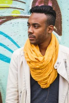 Latin man posing outdoors Stock Photos