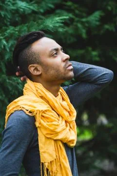 Latin man posing outdoors Stock Photos