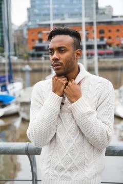 Latin man posing outdoors Stock Photos