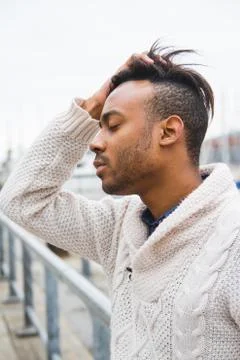 Latin man posing outdoors Stock Photos