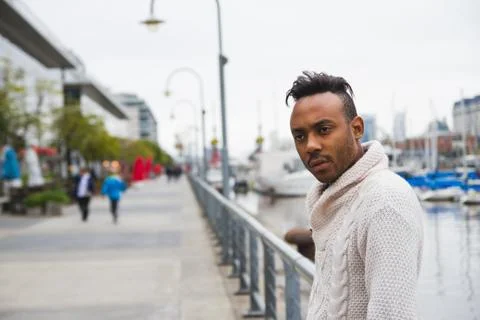 Latin man posing outdoors Stock Photos