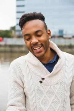 Latin man posing outdoors Stock Photos