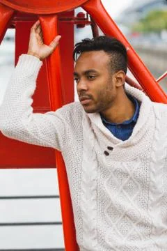 Latin man posing outdoors Stock Photos