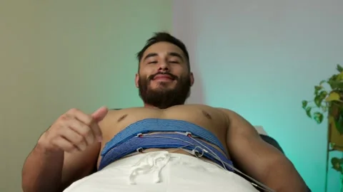 Latin mexican model guy muscle beard look to camera and smile while Stock Footage 249530737