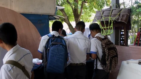 Latin students working on project at Guatemalan school Stock Footage 116668691