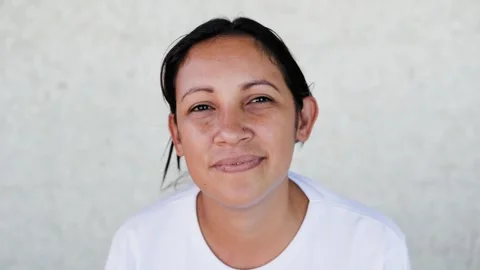 Latin woman looking at camera, Authentic people and ethnic diversity concept Stock Footage 277336499
