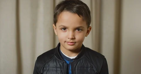 Latino boy smiling at the camera Stock Footage 104102133