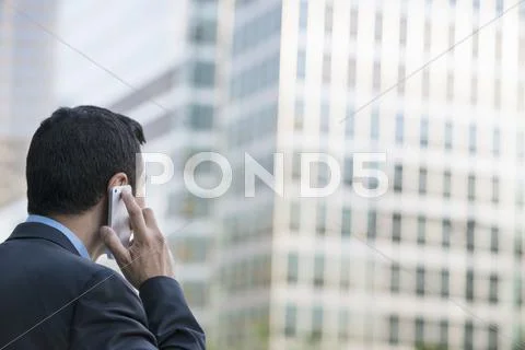 A Latino businessman on the phone Stock Photos