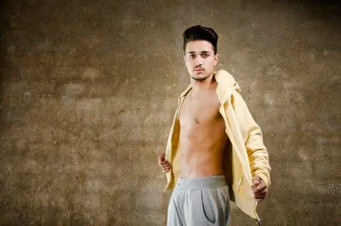 Latino man posing on wall Stock Photos