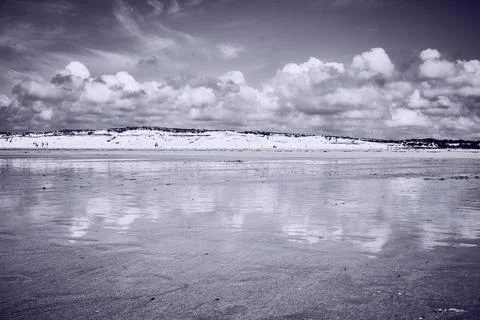 Latorche beach cloud reflection Stock Photos