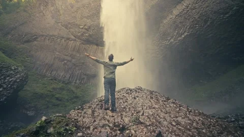 Latourell Falls Waterfall Oregon Washington Man Standing Rocks Columbia Gorge Video stock 280702578