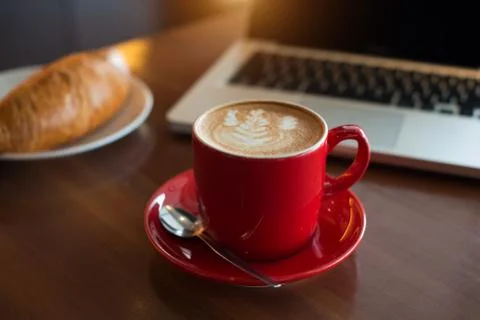 Latte with laptop Stock Photos