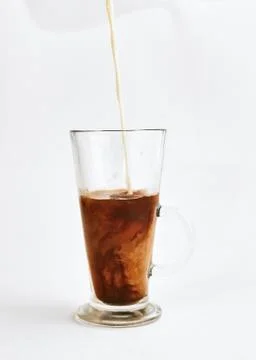 Latte in the process. Stock Photos