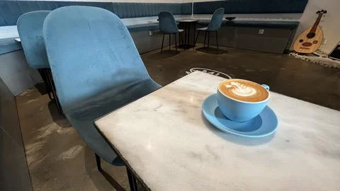 Latte served on table Stock Photos