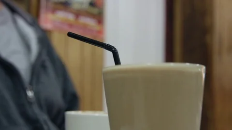 Latte sitting on table in cafe Видео 75457556