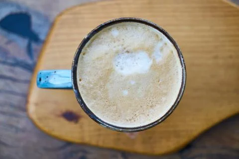Latte on wooden table Stock Photos