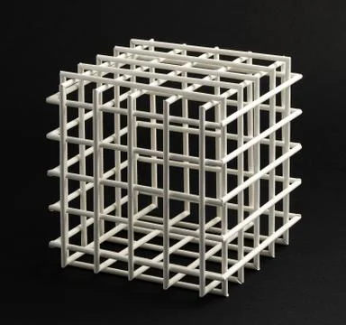 Lattice cube on a black background Stock Photos