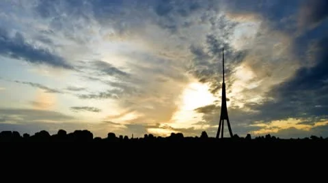 Latvia Riga TV Tower sunset clouds Stock Footage 10593097