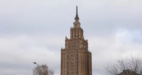 Latvian Academy of Sciences tower against soft clouds in Riga. Stock Footage 320169970