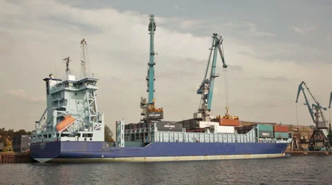 Latvian container ship loading containers by cranes Stock-Footage 41851977