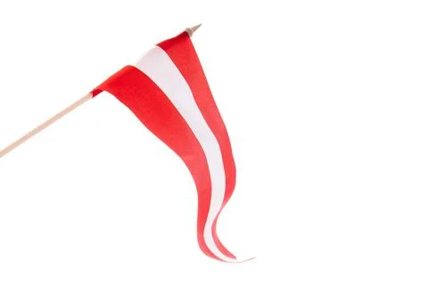 The Latvian flag on a white background is developing and flying in the wind Stock Photos