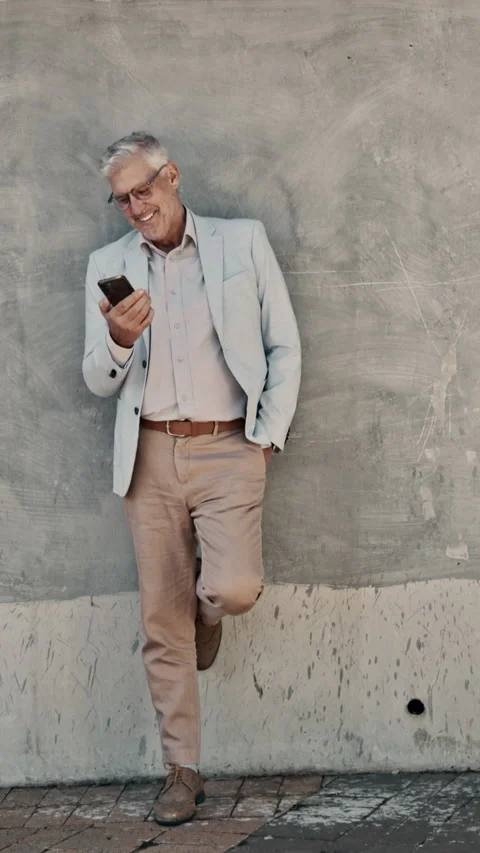 Laugh, break and man on wall with phone, online communication or comic post on Stock Footage 340453137