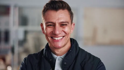 Laugh, construction and face of man in building for evaluation, renovation and Stock Footage 341660354