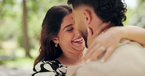 Laugh, forehead touch and couple in park for bonding, dating and commitment for Stockbeeldmateriaal 303461742