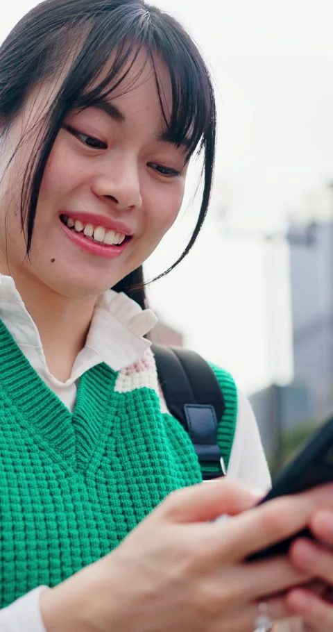 Laugh, text and university student in city with phone, online chat and comic Stock Footage 341099370