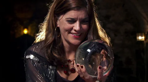Laughing fortune teller with crystal ball HD Stock Footage 40363587